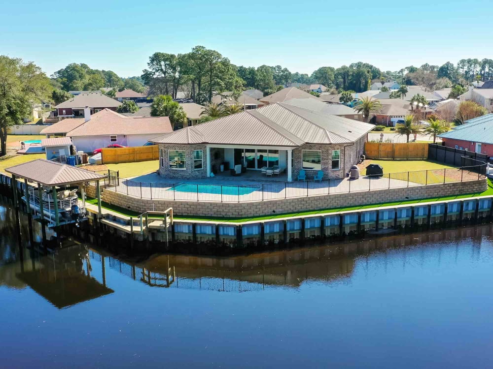 Exterior Image of a custom home and backyard in Gulf Breeze, FL by Urban Infill