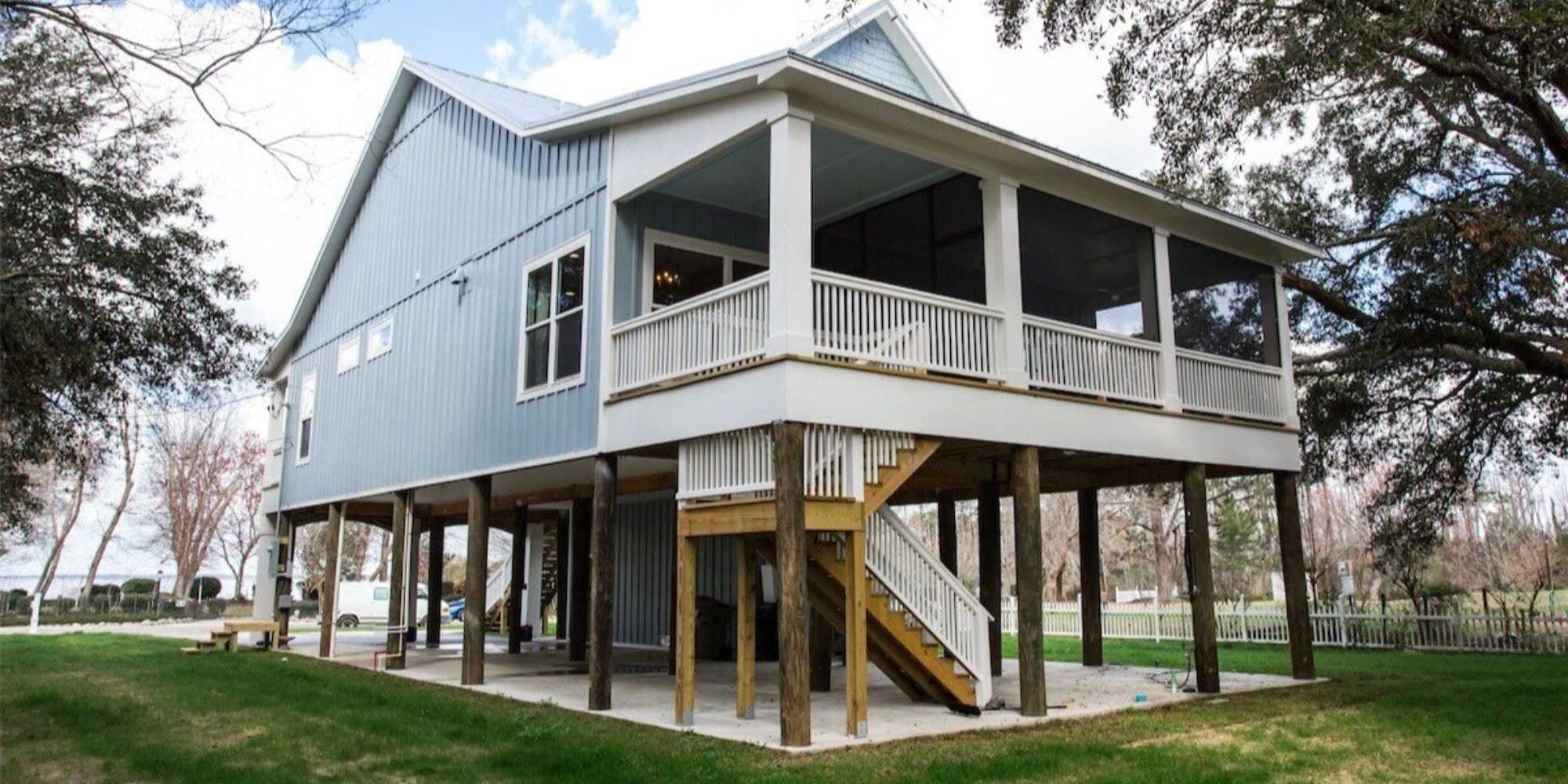 Pilon house with porch built in Pensacola, FL by Urban Infill
