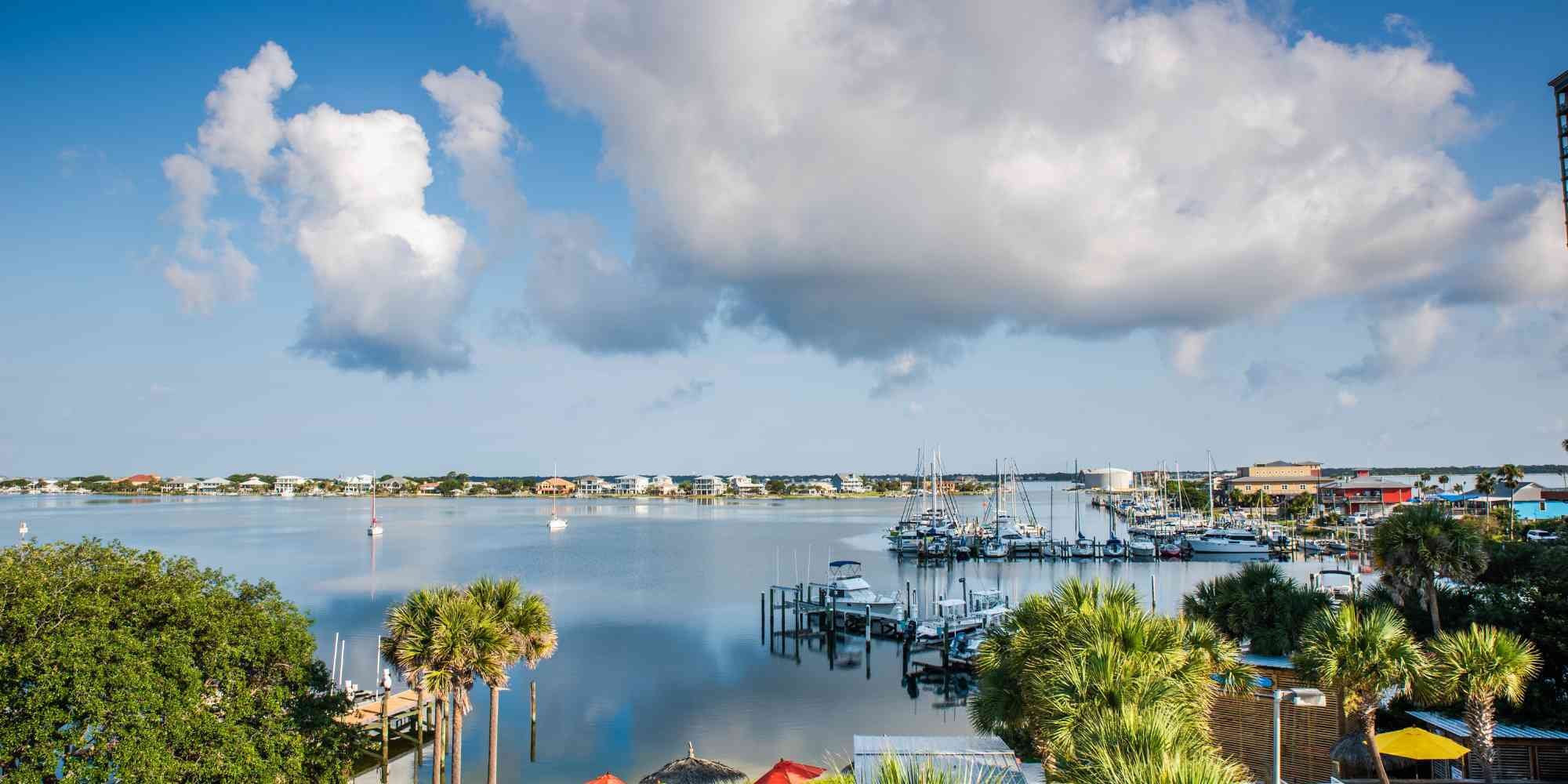 View of boat docks and homes in the distance in Pensacola, FL - Urban Infill custom home builders