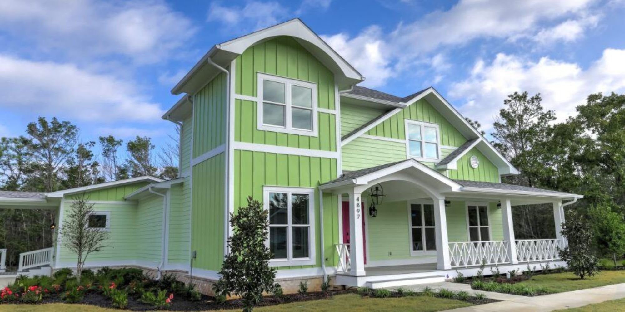 Colorful custom home by Urban Infill with white trim in North Hill, Pensacola, FL